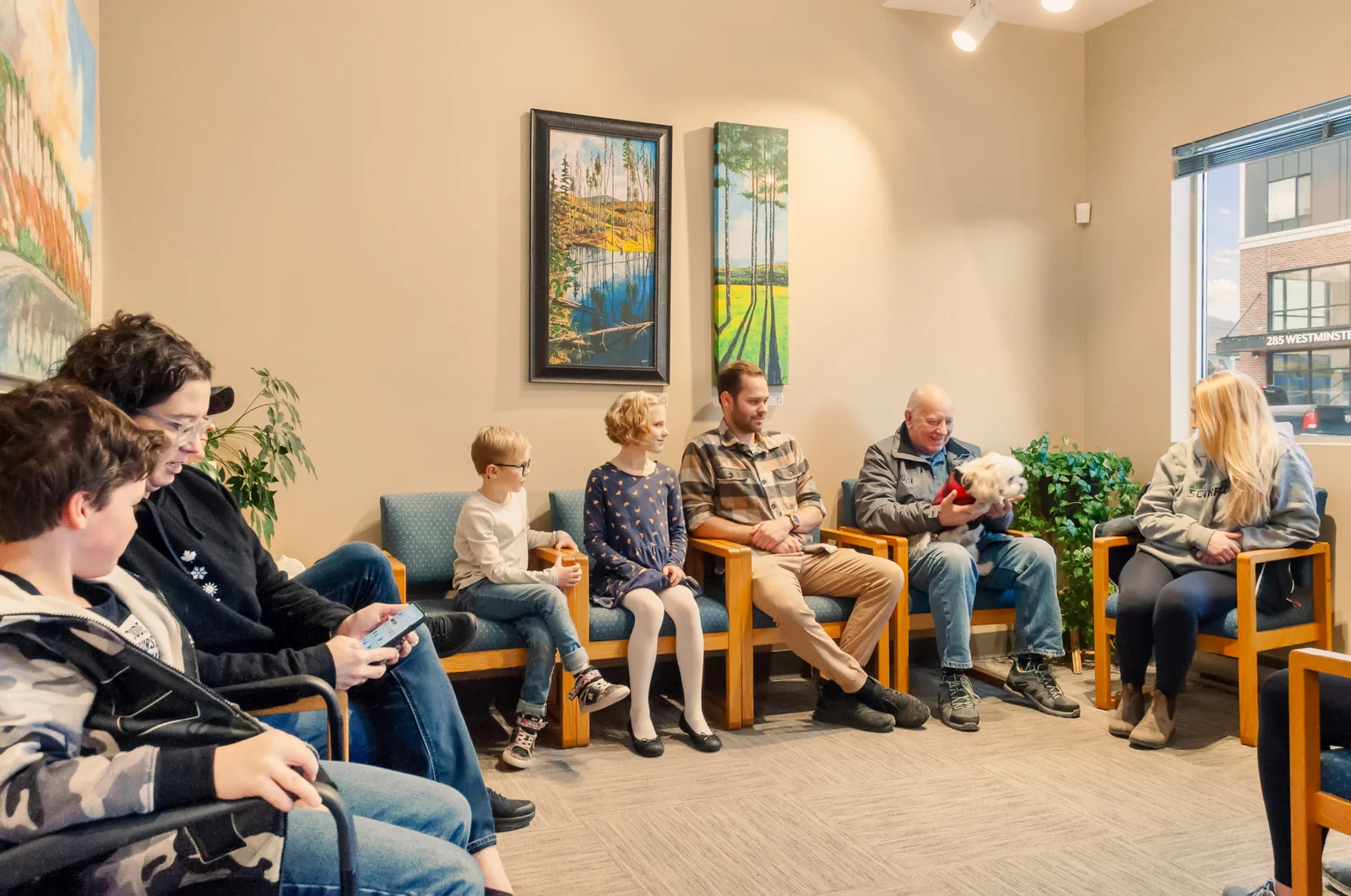 Patients waiting comfortably in the Okanagan Chiropractic Center waiting room in Penticton
